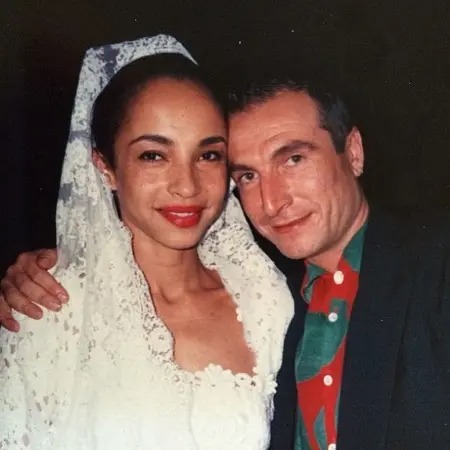 Carlos Scola Pliego and Sade Adu's wedding photo.